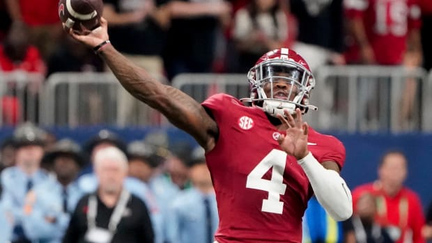 Dec 2, 2023; Atlanta, GA, USA; Alabama Crimson Tide quarterback Jalen Milroe (4) throws against Georgia at Mercedes-Benz Stadium. Milroe was named the MVP. Alabama defeated Georgia 27-24 to claim the SEC Championship.
